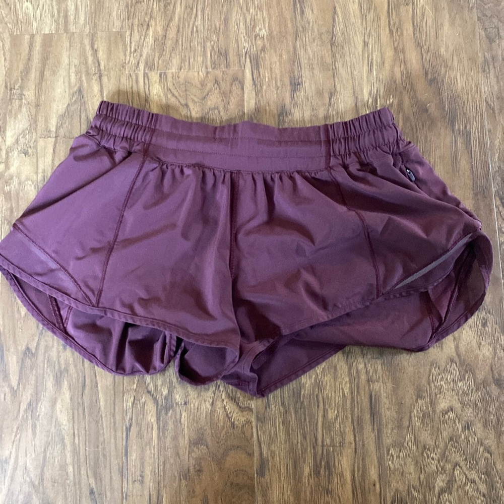 Lululemon shorts 2.5in. Seam. Don’t know what size. Maroon
